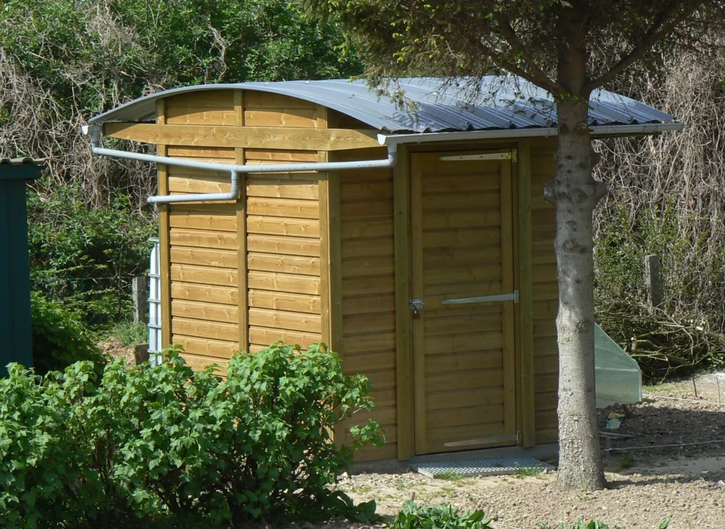 Abris avec bac acier cintré